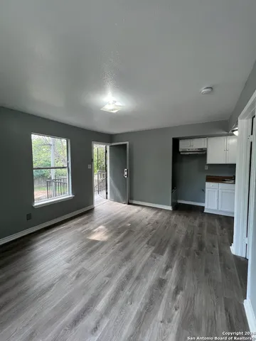 a kitchen with stainless steel appliances granite countertop a stove and a sink