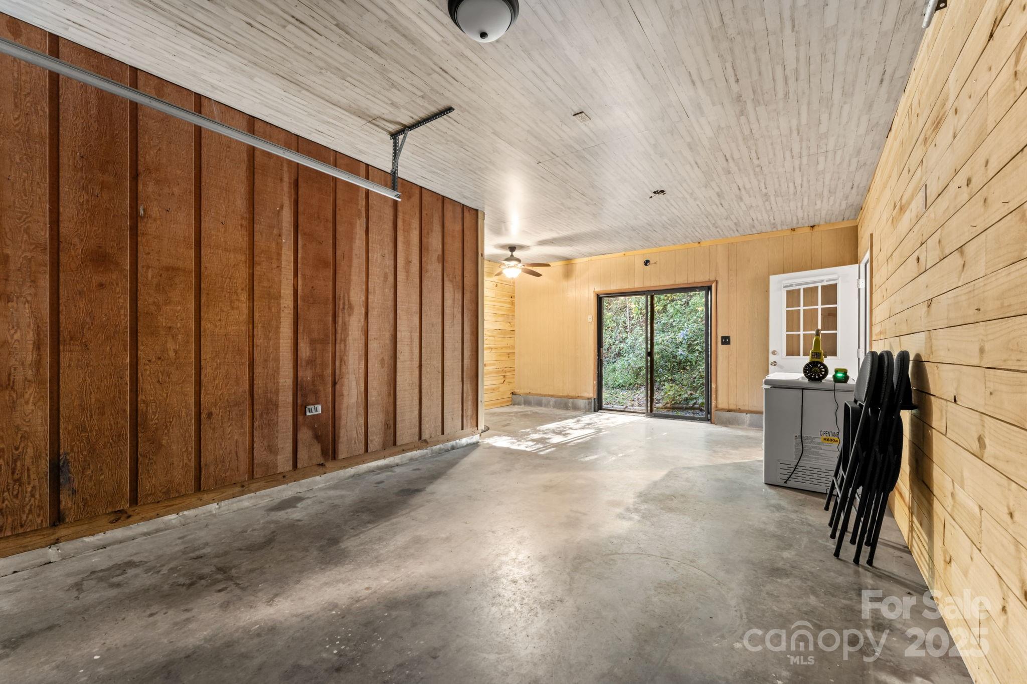 621 Kitchens Branch Road Sylva, NC 28779 - Photo 26 of 29 a view of a livingroom with furniture and staircase