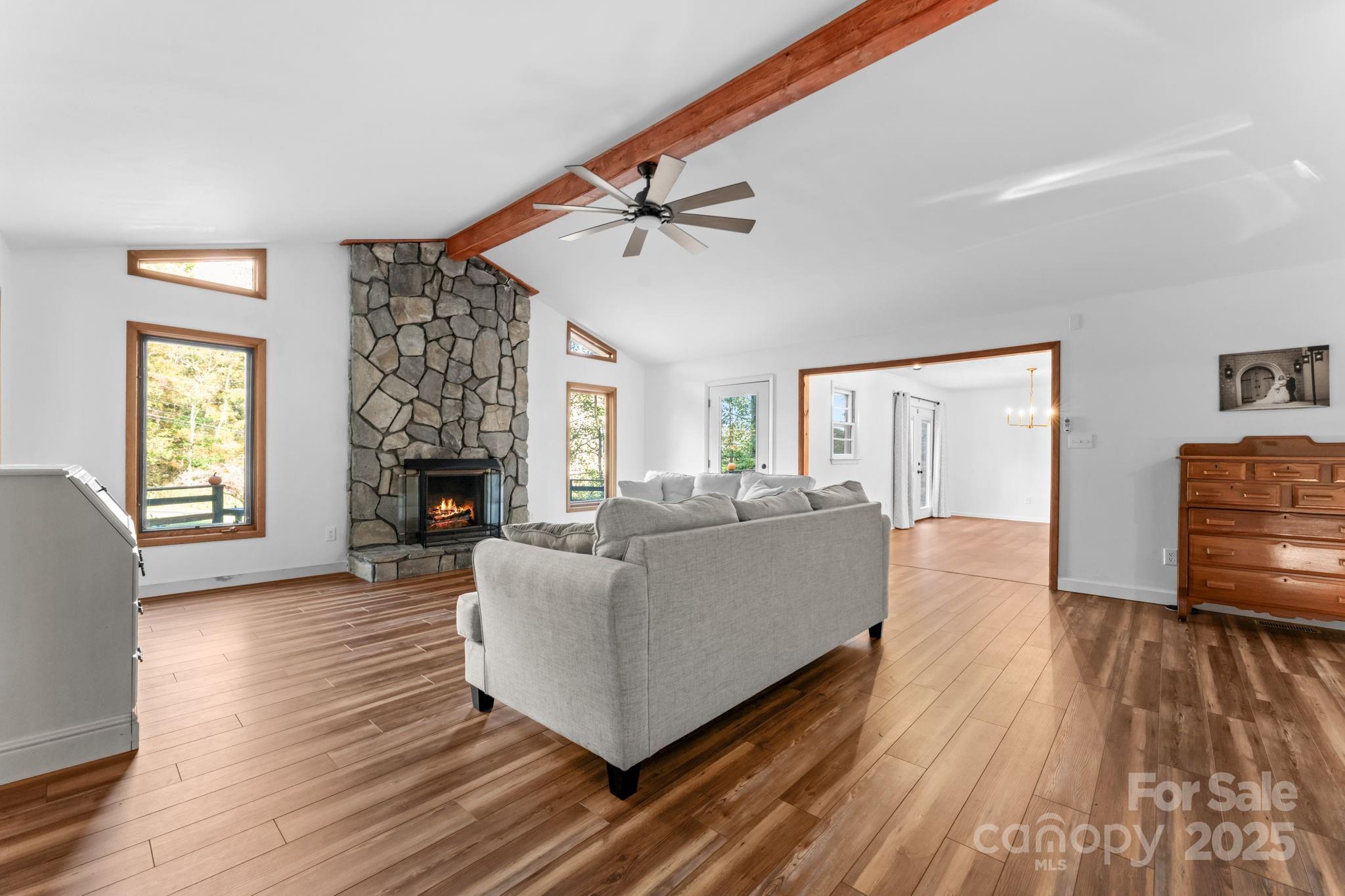 621 Kitchens Branch Road Sylva, NC 28779 - Photo 4 of 29 a living room with furniture and a fireplace