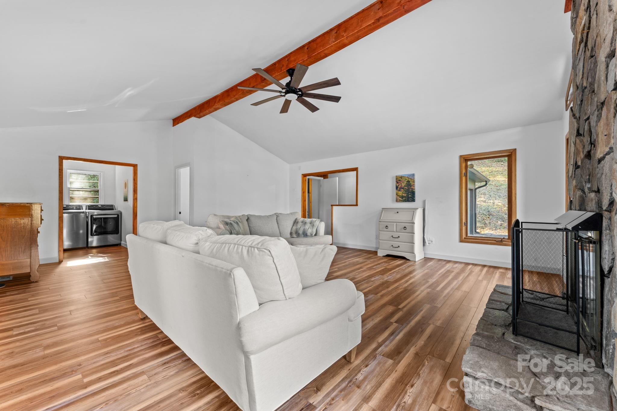 621 Kitchens Branch Road Sylva, NC 28779 - Photo 6 of 29 a living room with furniture and wooden floor