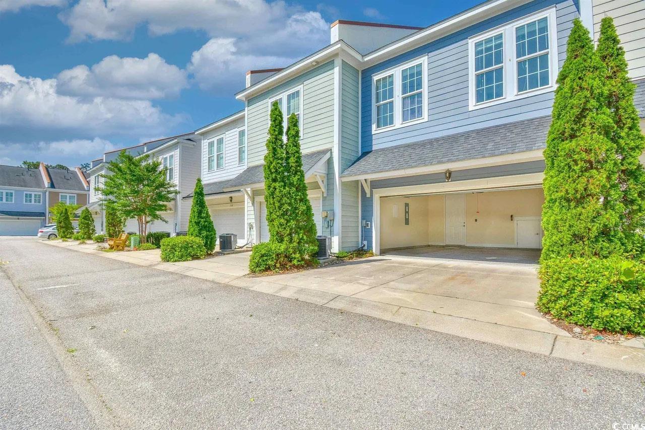 750 Shine Avenue, Unit 750 Myrtle Beach, SC 29577 - Photo 12 of 34 Traditional home featuring driveway and a residential view