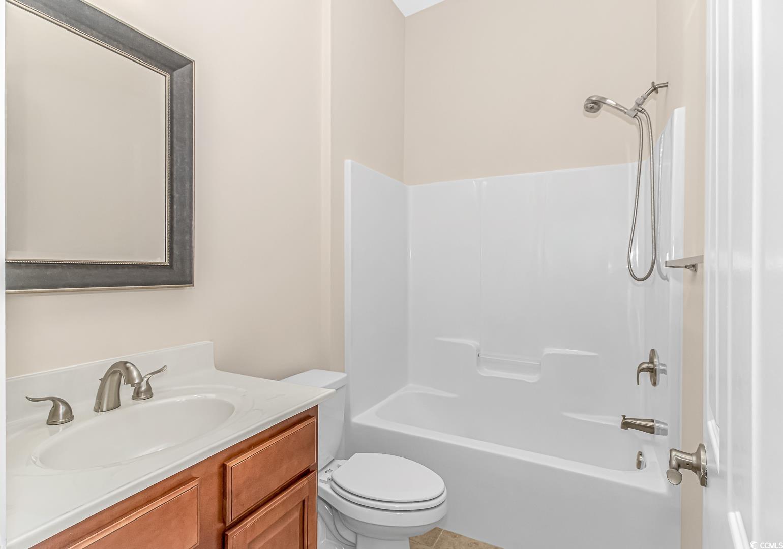 750 Shine Avenue, Unit 750 Myrtle Beach, SC 29577 - Photo 18 of 34 Bathroom with vanity and shower / bathtub combination