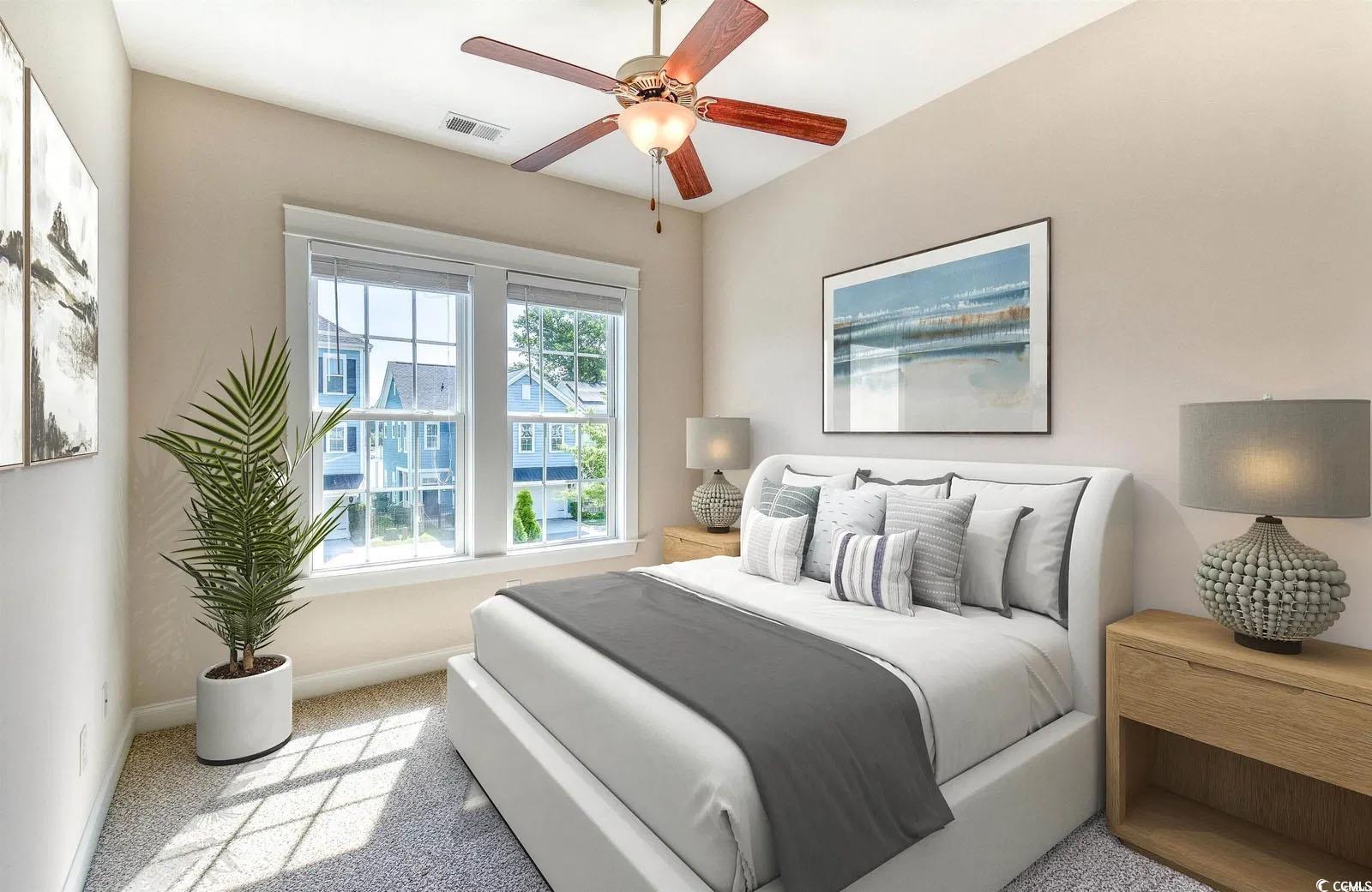 750 Shine Avenue, Unit 750 Myrtle Beach, SC 29577 - Photo 19 of 34 Bedroom featuring light carpet and ceiling fan