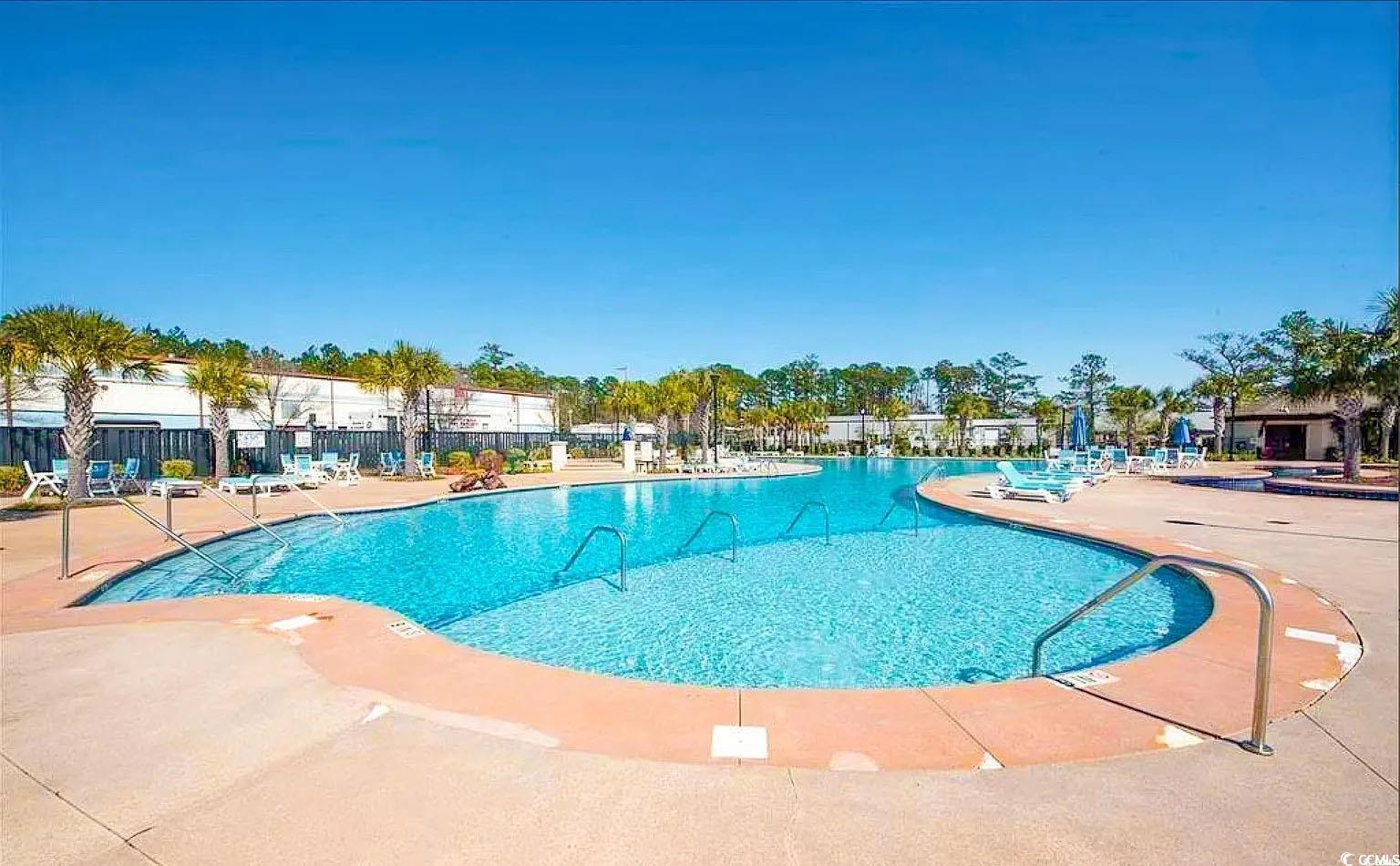 750 Shine Avenue, Unit 750 Myrtle Beach, SC 29577 - Photo 26 of 34 Community pool with a patio area