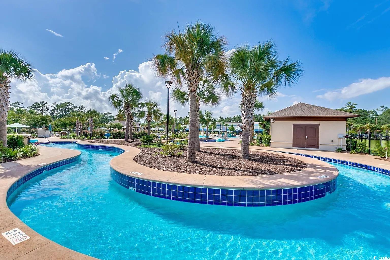 750 Shine Avenue, Unit 750 Myrtle Beach, SC 29577 - Photo 27 of 34 Community pool with a patio area