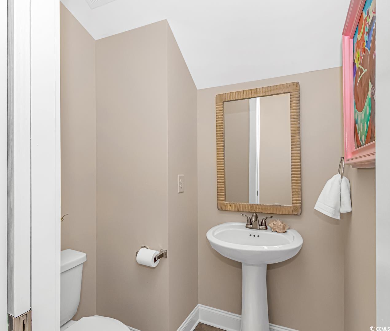 750 Shine Avenue, Unit 750 Myrtle Beach, SC 29577 - Photo 10 of 34 Bathroom featuring baseboards and toilet