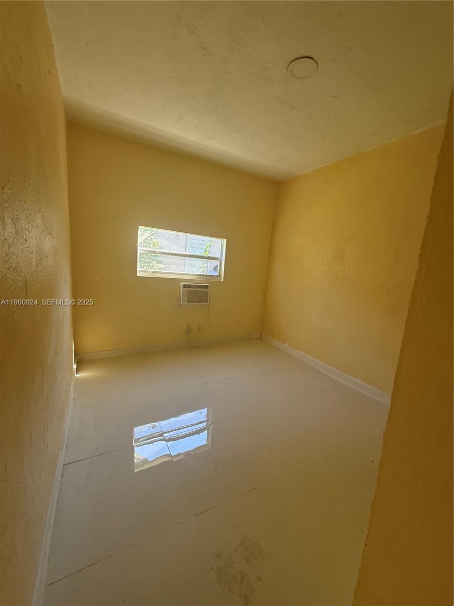1918 Northwest 82nd Street Miami, FL 33147 - Photo 13 of 15 a view of empty room