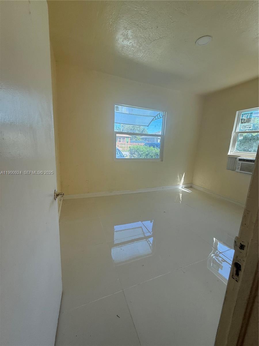 1918 Northwest 82nd Street Miami, FL 33147 - Photo 14 of 15 a view of a hallway