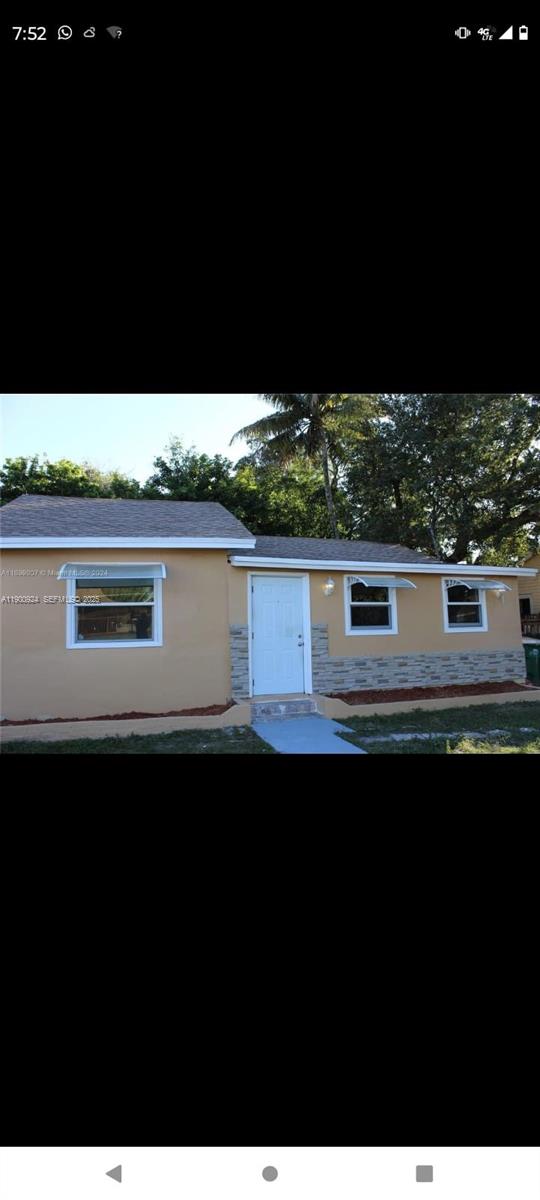 1918 Northwest 82nd Street Miami, FL 33147 - Photo 3 of 15 a view of outdoor space with swimming pool