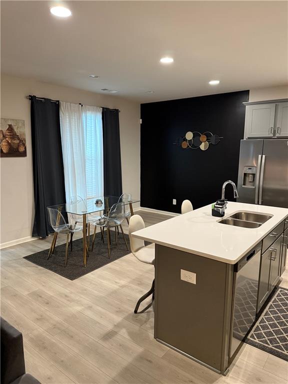 2957 Cottage Lane Atlanta, GA 30337 - Photo 3 of 21 a kitchen with a sink and a refrigerator