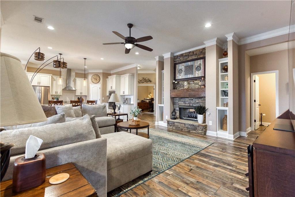 390 Herring Road Grayson, GA 30017 - Photo 14 of 59 a living room with furniture and a fireplace