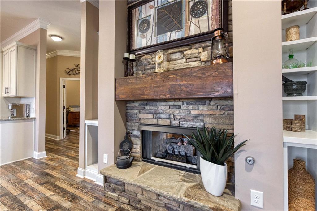 390 Herring Road Grayson, GA 30017 - Photo 15 of 59 a living room with furniture and a fireplace