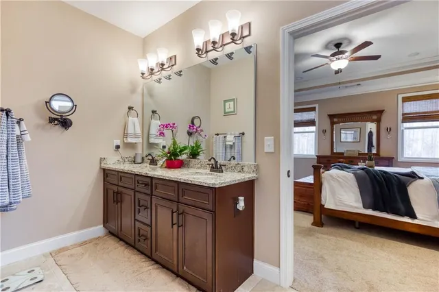 a utility room with sink dryer and washer