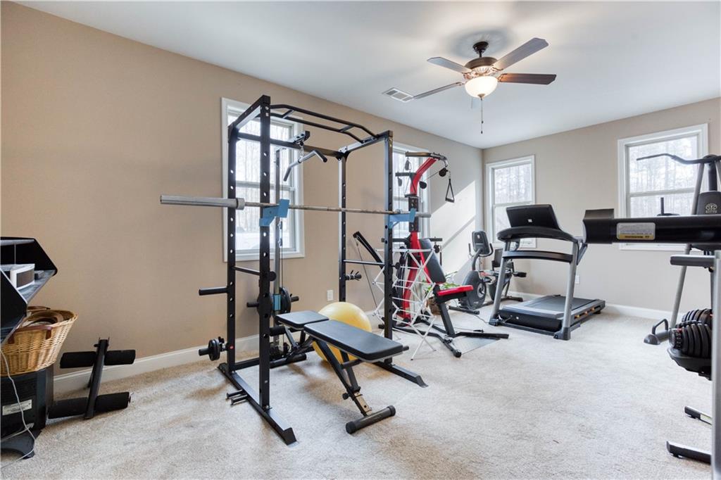390 Herring Road Grayson, GA 30017 - Photo 33 of 59 a view of a room with gym equipment