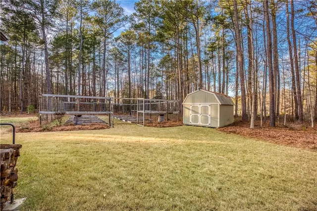 a view of residential houses with swimming pool