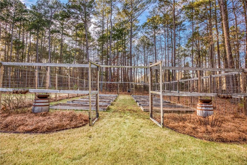 390 Herring Road Grayson, GA 30017 - Photo 54 of 59 a view of a swimming pool with an outdoor seating