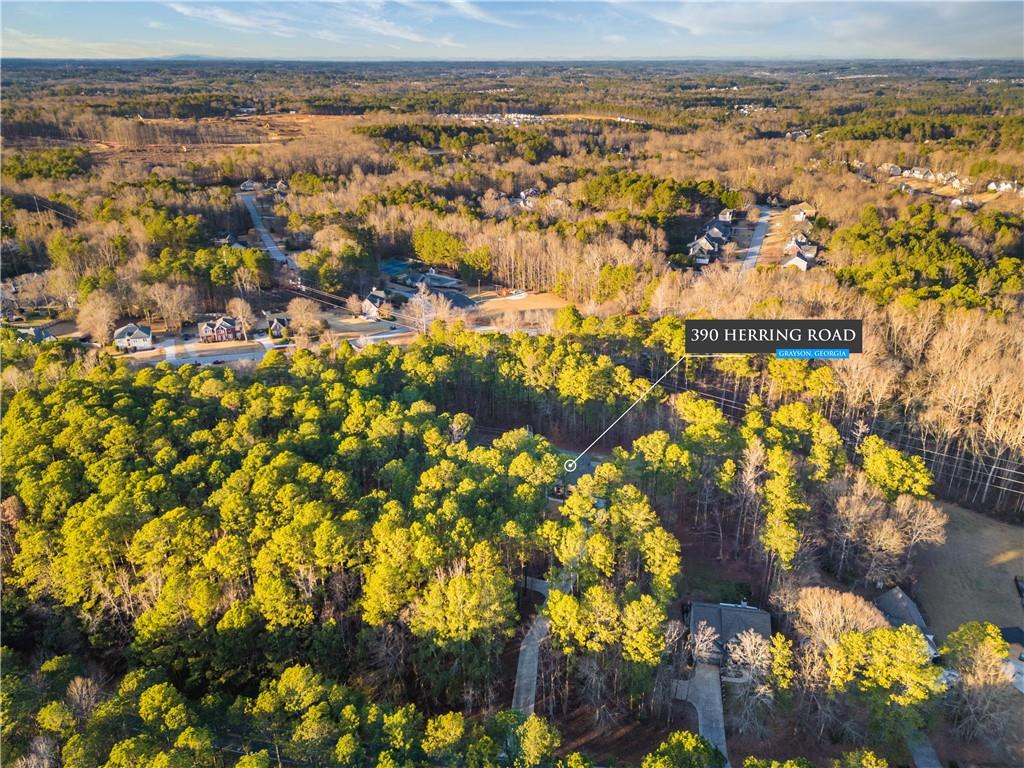 390 Herring Road Grayson, GA 30017 - Photo 59 of 59 a view of residential houses with swimming pool