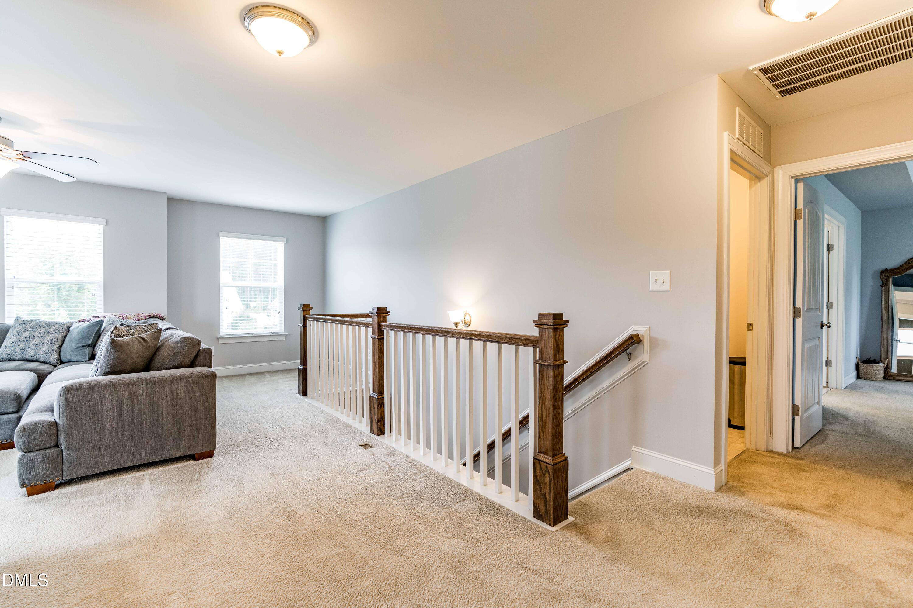 5405 Weathered Rock Court Knightdale, NC 27545 - Photo 15 of 36 a living room with furniture and a window