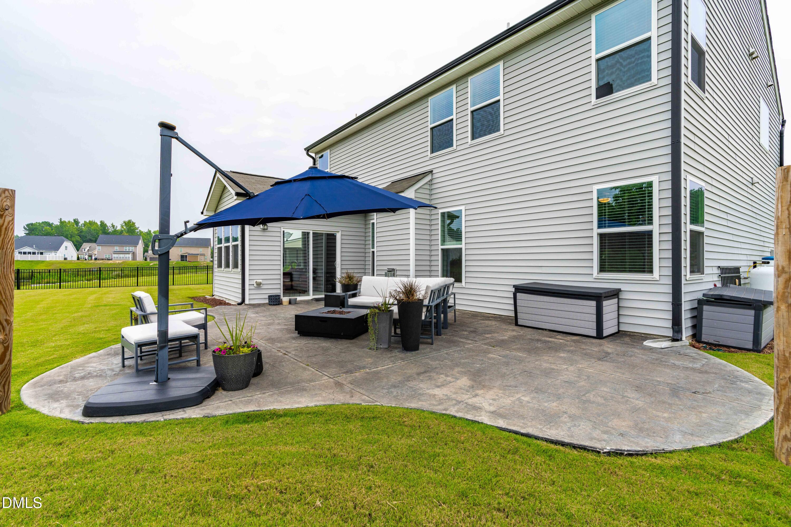 5405 Weathered Rock Court Knightdale, NC 27545 - Photo 31 of 36 a view of a house with swimming pool and sitting area