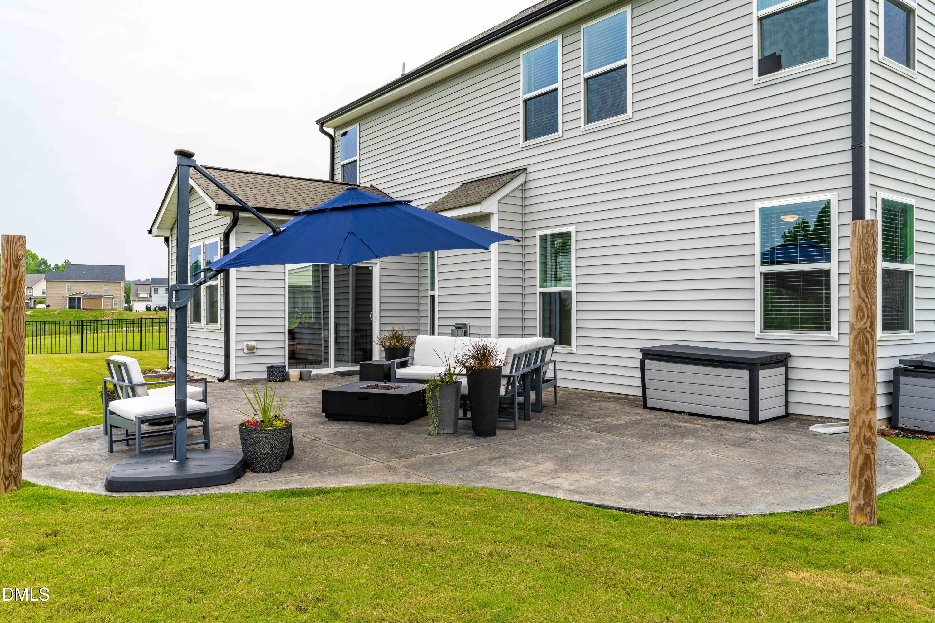 5405 Weathered Rock Court Knightdale, NC 27545 - Photo 35 of 36 a view of a house with backyard and sitting area