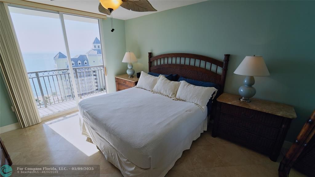 2011 North Ocean Boulevard, Unit 1606 Fort Lauderdale, FL 33305 - Photo 17 of 30 a bed sitting in a bedroom next to a window