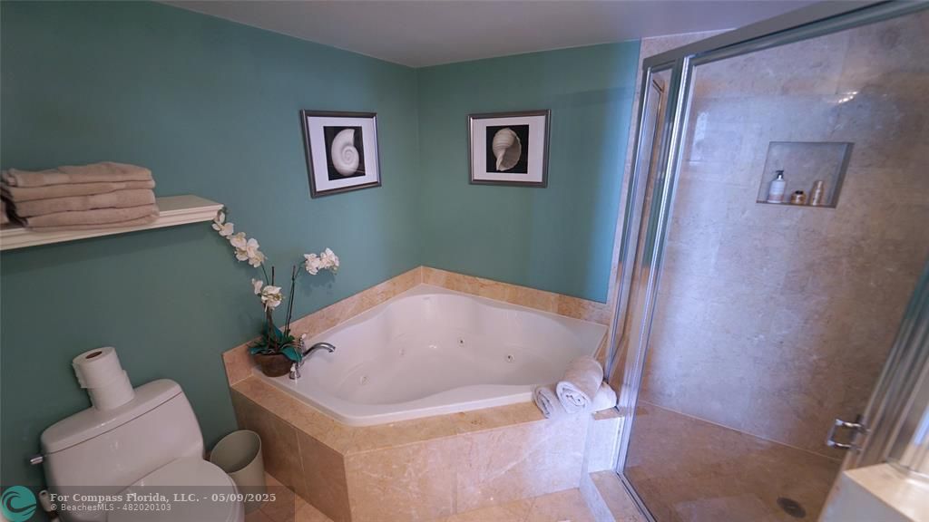 2011 North Ocean Boulevard, Unit 1606 Fort Lauderdale, FL 33305 - Photo 20 of 30 a bathroom with a sink and toilet