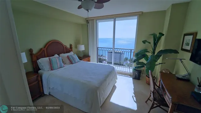 a bathroom with a shower and a toilet