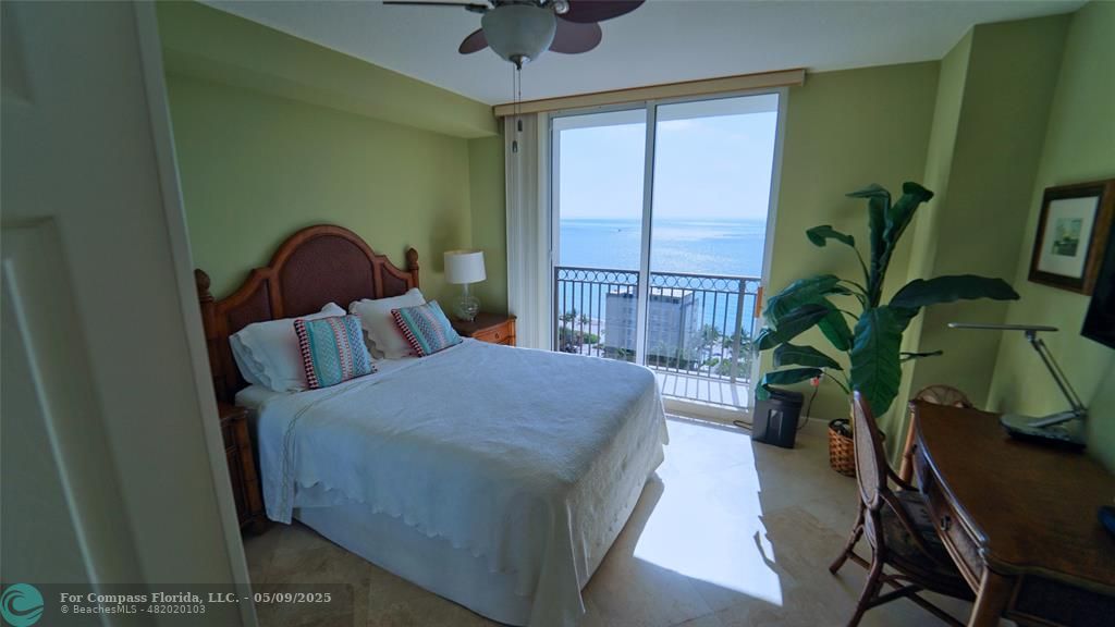 2011 North Ocean Boulevard, Unit 1606 Fort Lauderdale, FL 33305 - Photo 27 of 30 a bed sitting in a bedroom next to a window