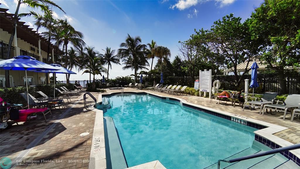 2011 North Ocean Boulevard, Unit 1606 Fort Lauderdale, FL 33305 - Photo 4 of 30 a view of swimming pool with chairs and tables