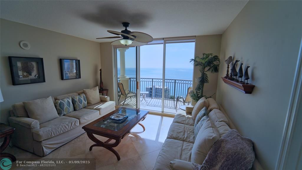 2011 North Ocean Boulevard, Unit 1606 Fort Lauderdale, FL 33305 - Photo 7 of 30 a living room with furniture and a window