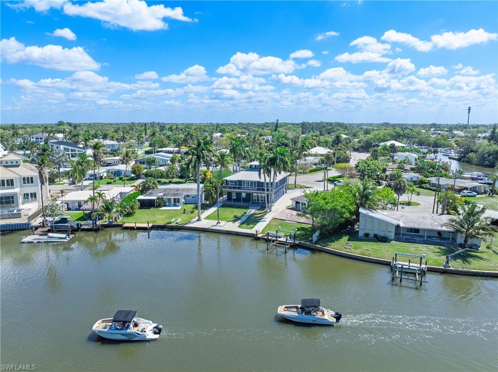 1836 Harbor Lane Naples, FL 34104 - Photo 2 of 40 a view of a lake with a city