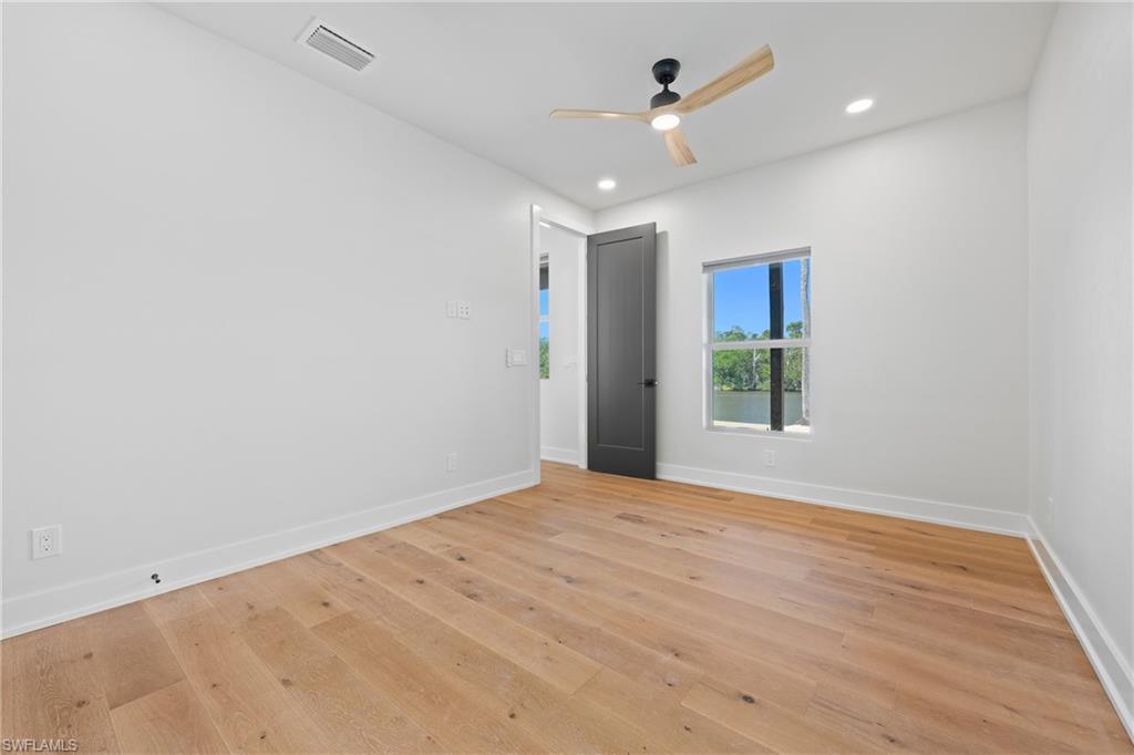 1836 Harbor Lane Naples, FL 34104 - Photo 24 of 40 a view of an empty room with a window