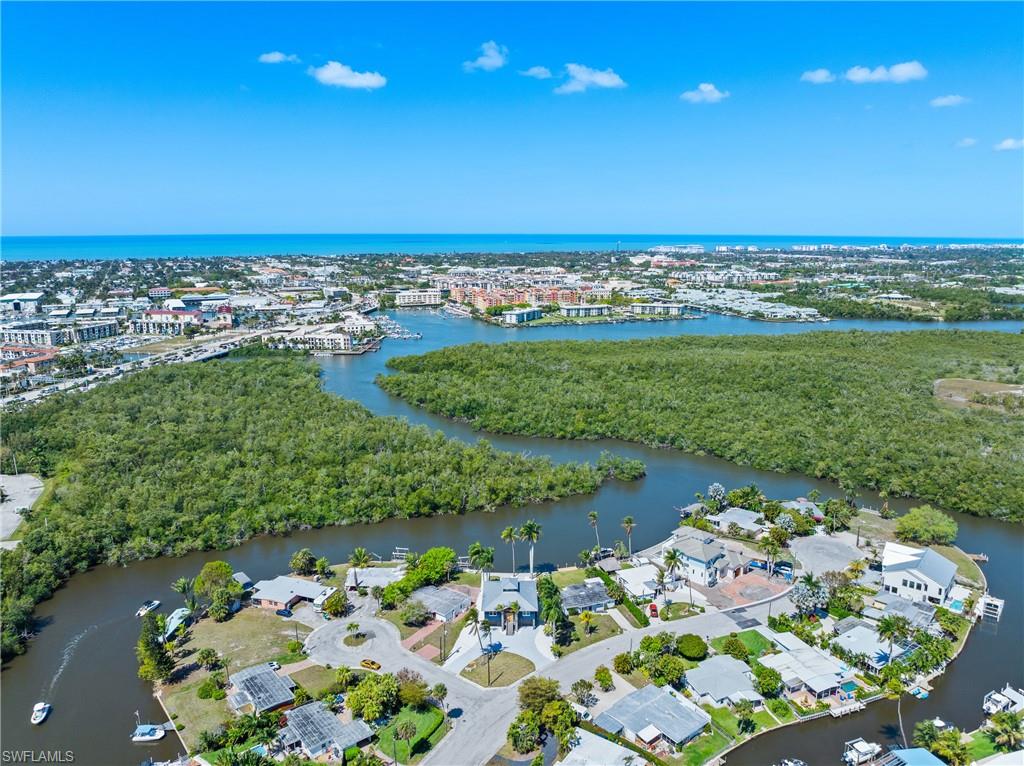 1836 Harbor Lane Naples, FL 34104 - Photo 38 of 40 a view of a lake with a city