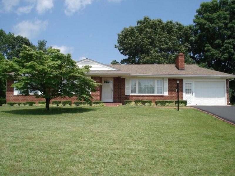 358 Blue Ridge Drive Blue Ridge, VA 24064 - Photo 1 of 22 a front view of a house with a garden