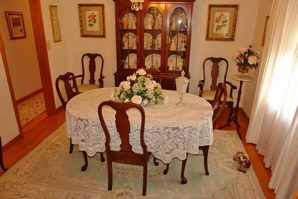 358 Blue Ridge Drive Blue Ridge, VA 24064 - Photo 8 of 22 a view of a dining room with furniture and chandelier