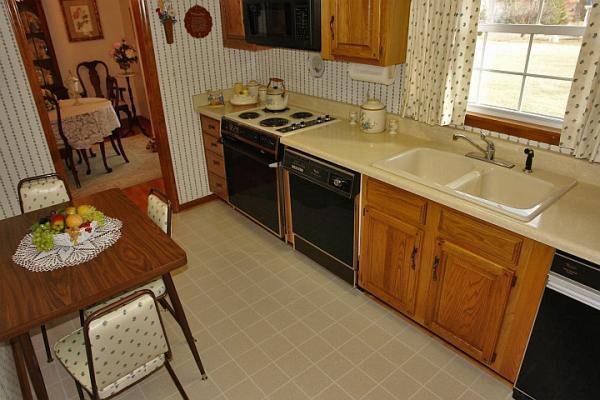 358 Blue Ridge Drive Blue Ridge, VA 24064 - Photo 10 of 22 a kitchen with stainless steel appliances granite countertop a sink stove and cabinets
