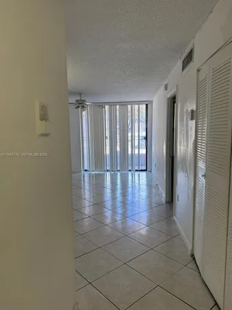a view of entryway with livingroom