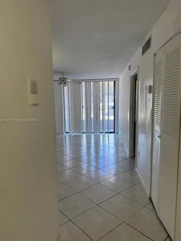 a view of entryway with livingroom