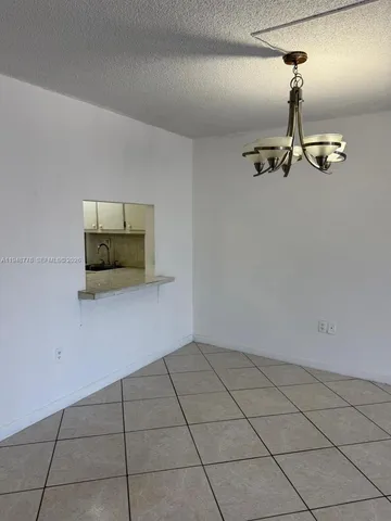 a view of a livingroom with a furniture