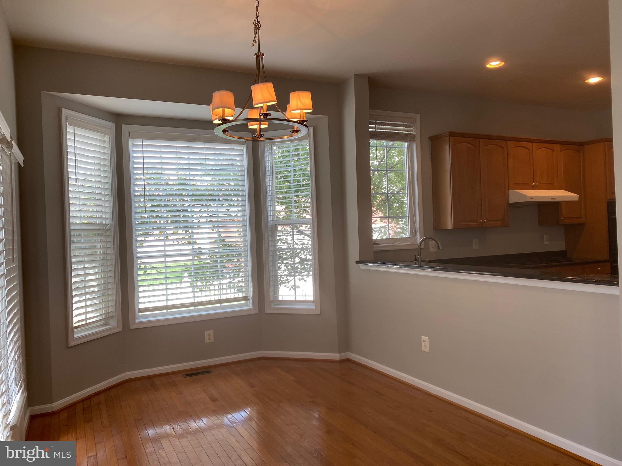 3948 Addison Woods Road Frederick, MD 21704 - Photo 15 of 19 a view of a room with a window and chandelier