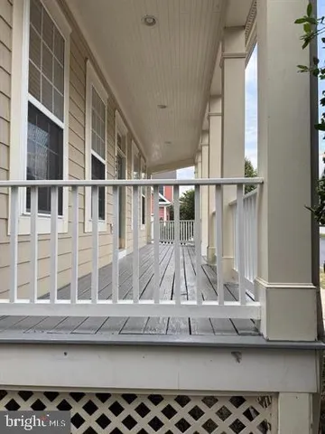 a view of a car park in front of house