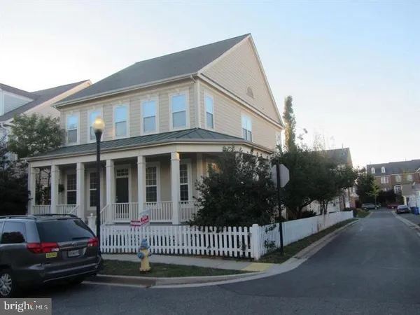a car parked in front of a house