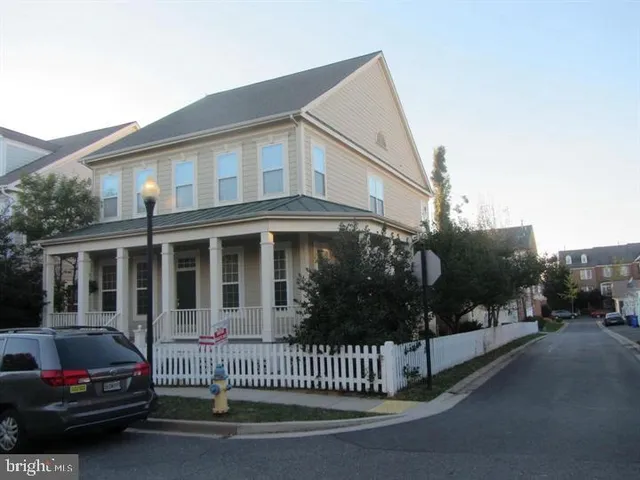 a car parked in front of a house