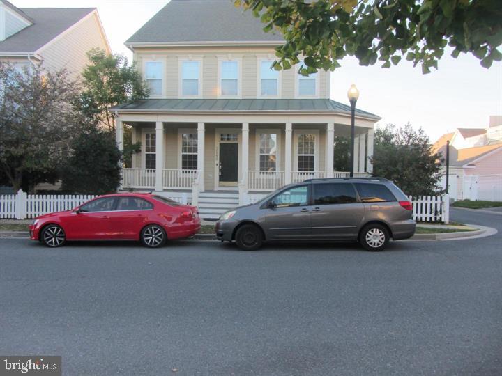 3948 Addison Woods Road Frederick, MD 21704 - Photo 5 of 19 a car parked in front of a house