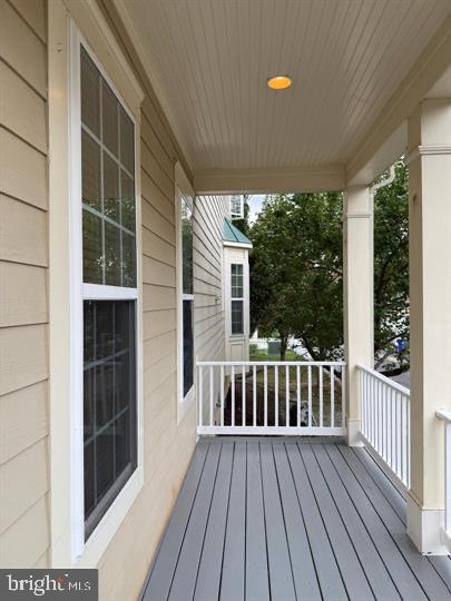 3948 Addison Woods Road Frederick, MD 21704 - Photo 6 of 19 a view of porch with wooden floor