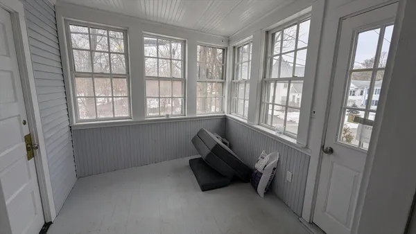 wooden floor and window in a room