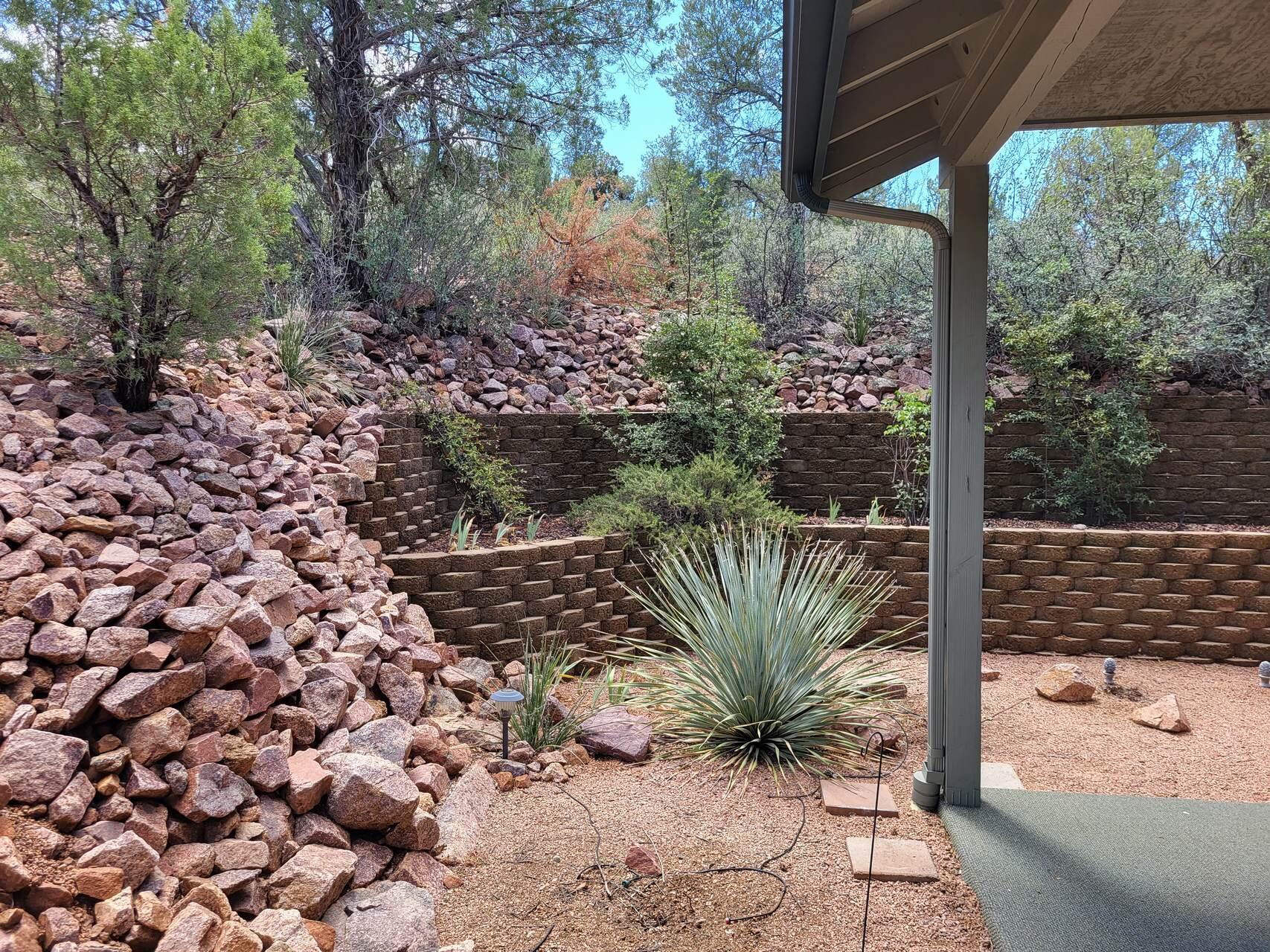 1120 South Sycamore Circle Payson, AZ 85541 - Photo 35 of 44 a view of a backyard with plants and a garden