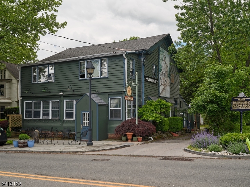 13 Bridge Street Stockton, NJ 08559 - Photo 1 of 11 a view of a house with a patio