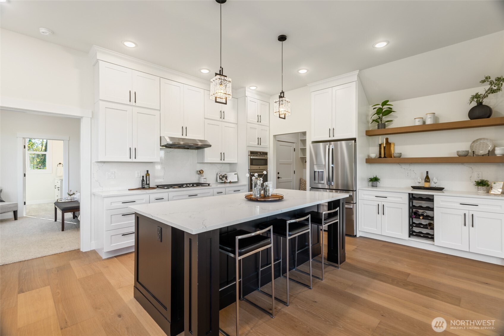 1354 Huntley Road Bellingham, WA 98226 - Photo 12 of 40 a kitchen with kitchen island a sink a stove a center island and appliances