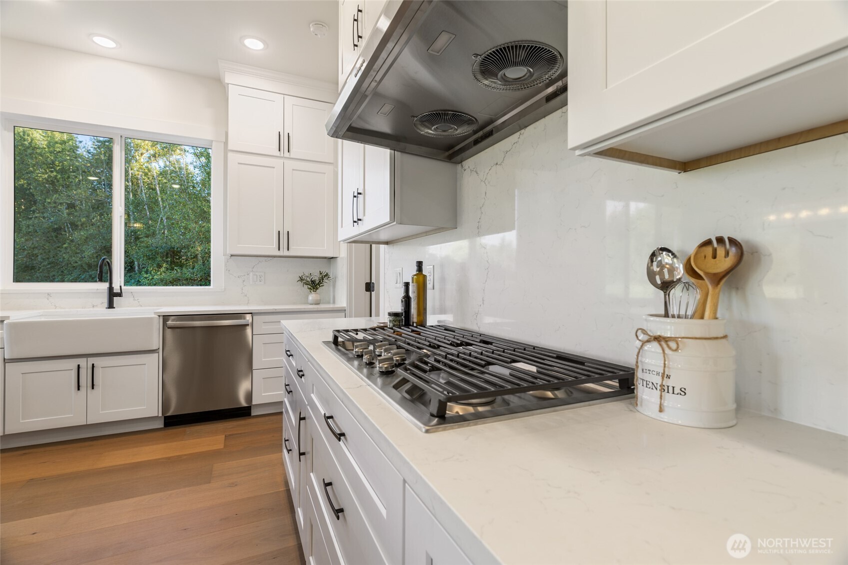 1354 Huntley Road Bellingham, WA 98226 - Photo 13 of 40 a kitchen with a stove a sink and a refrigerator